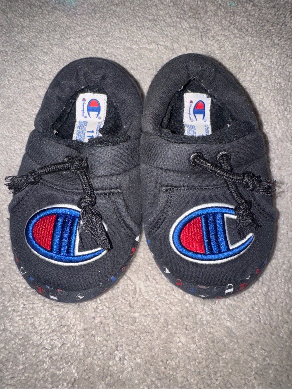 Champion Black Kids Slip-On Shoes with Blue and Red Logo